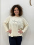 Maglia in tessuto rasato con scritta paillettes
