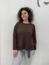 Maglia in tessuto rasato con scritta paillettes