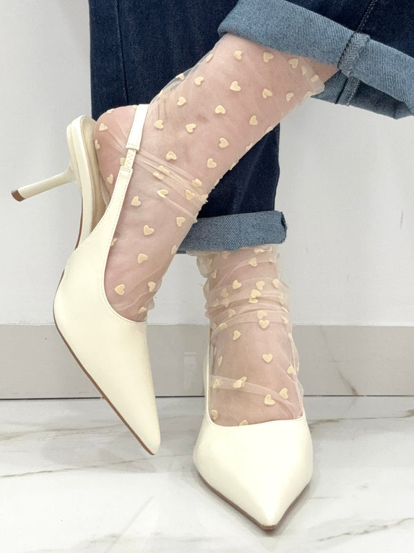 Decollete slingback in vernice