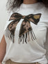 T-shirt con stampa fiocco animalier