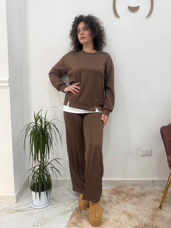 Tuta blooma con sottostrato bianco