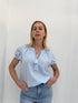 Blusa cotone con nappina