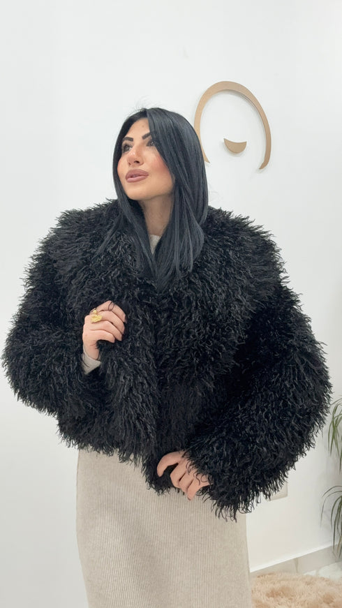 Pelliccia pelo riccio