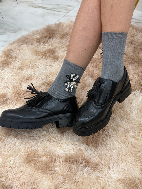 Francesina con nappine